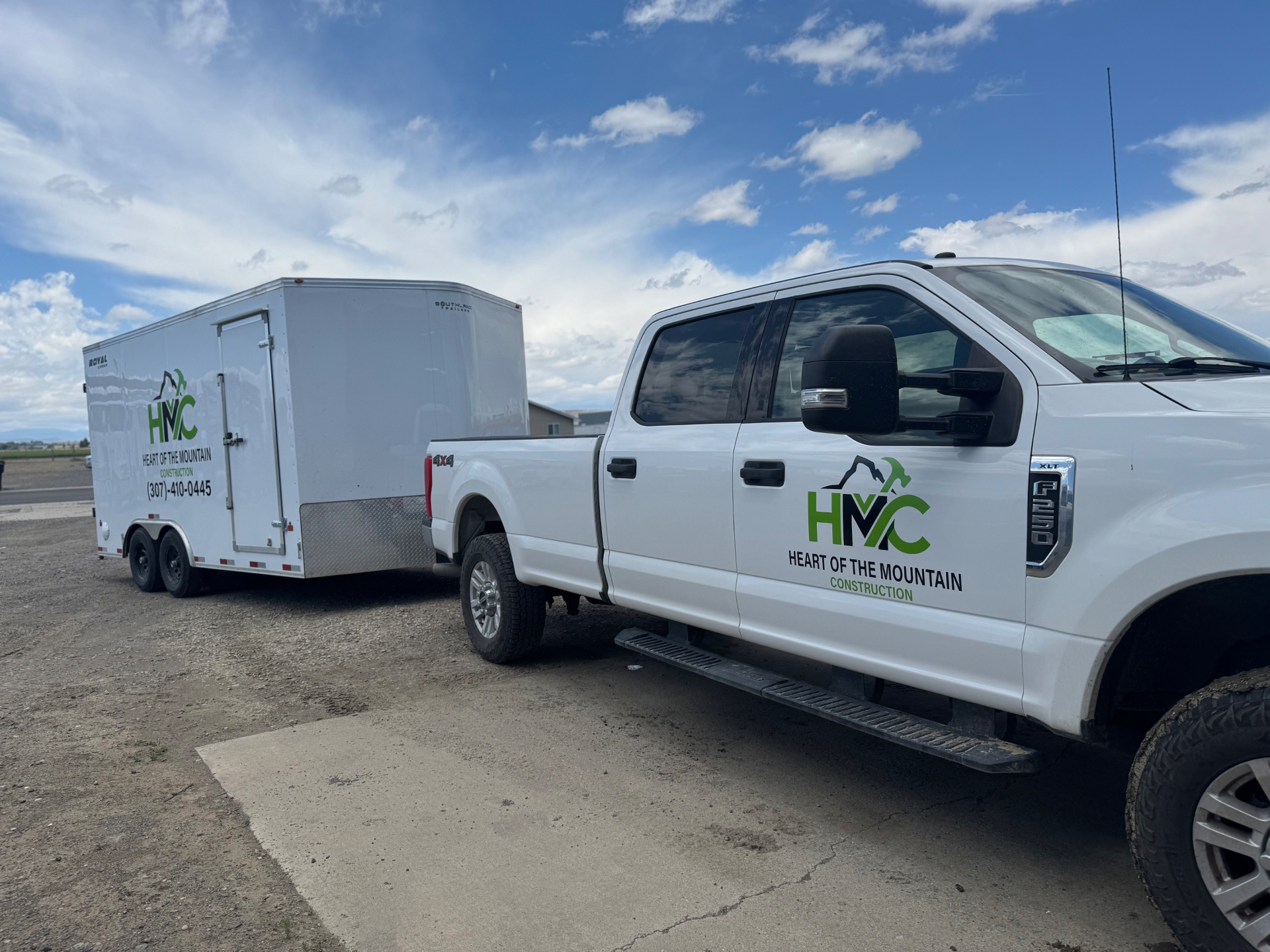 HMC Construction F-250 with matching wrapped trailer