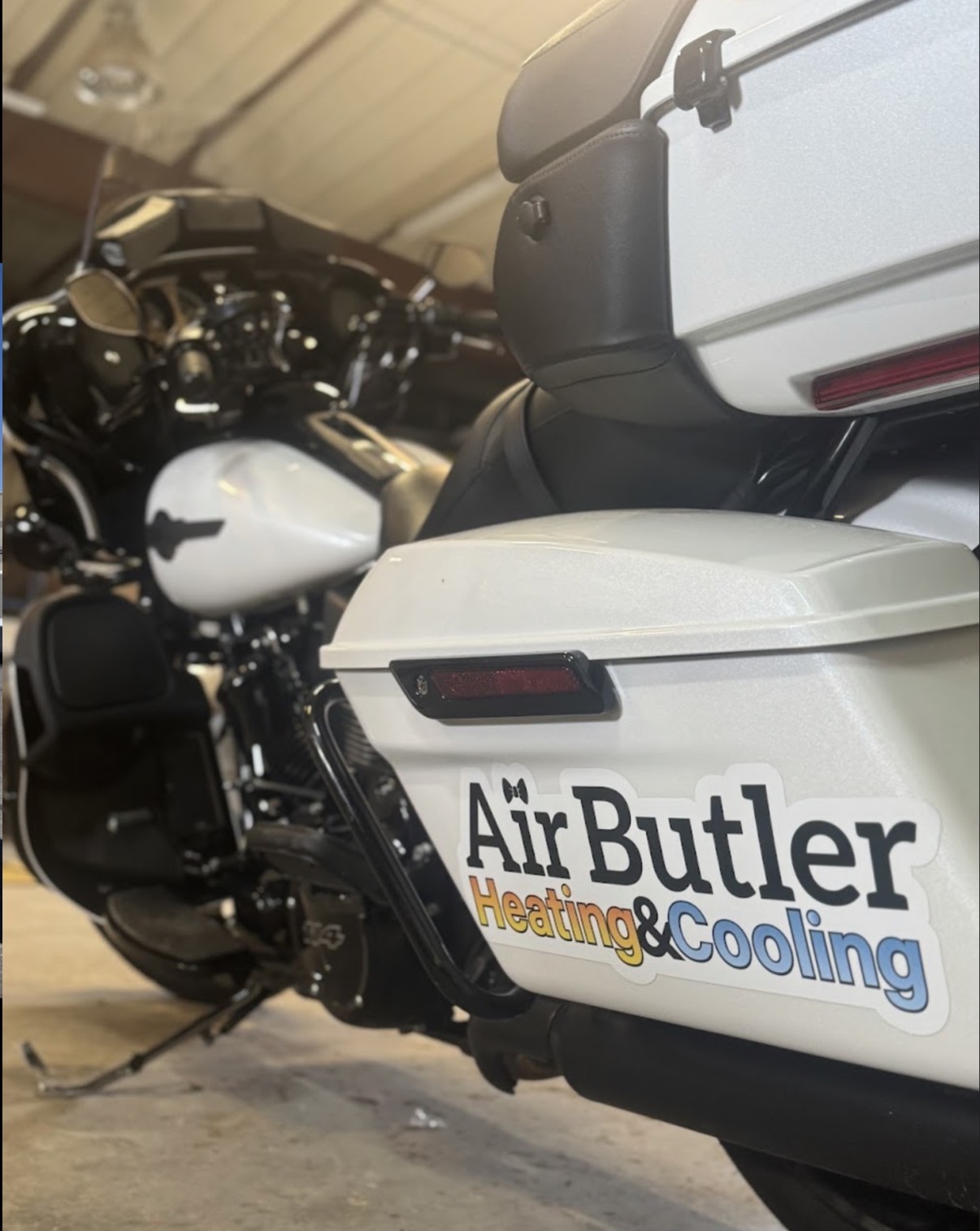 Air Butler logo decal applied to Harley-Davidson saddlebag