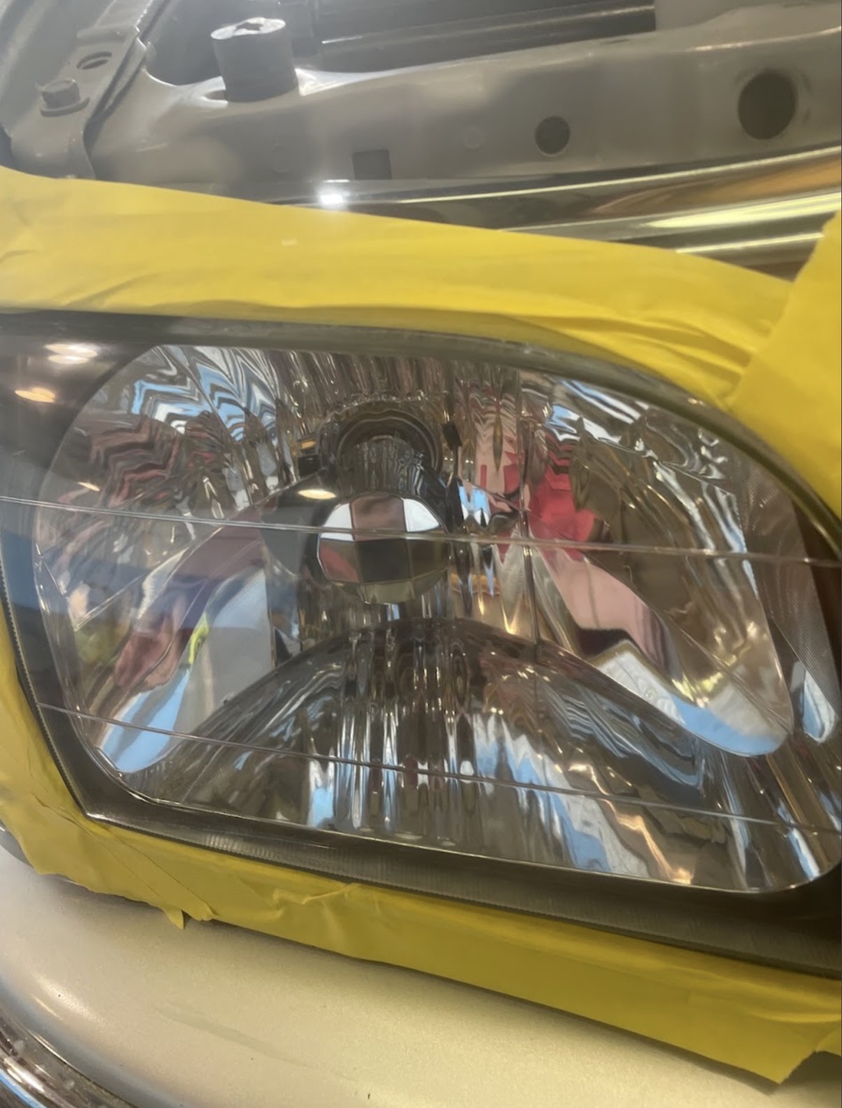 Headlight masked and prepped for clear coat
